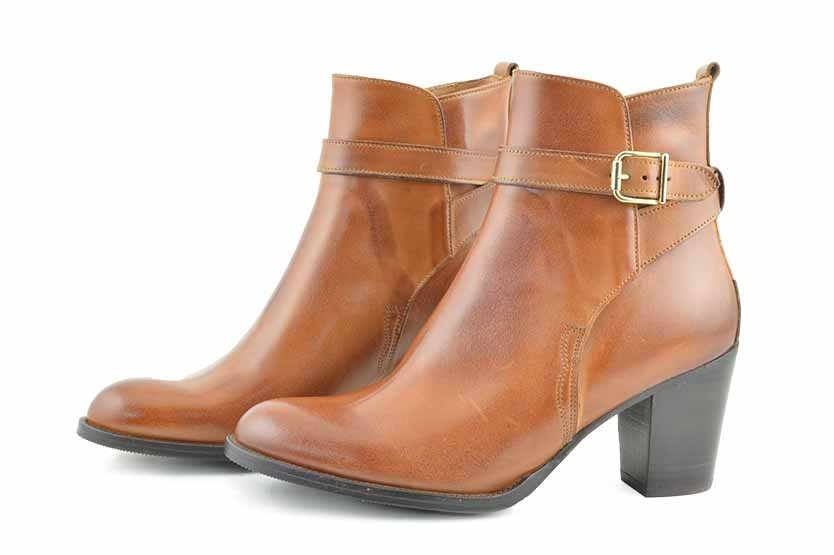 BOOT WITH HEEL, STRAP AND BUCKLE